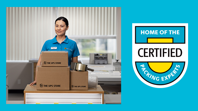 Female Employee Behind Stacked Boxes