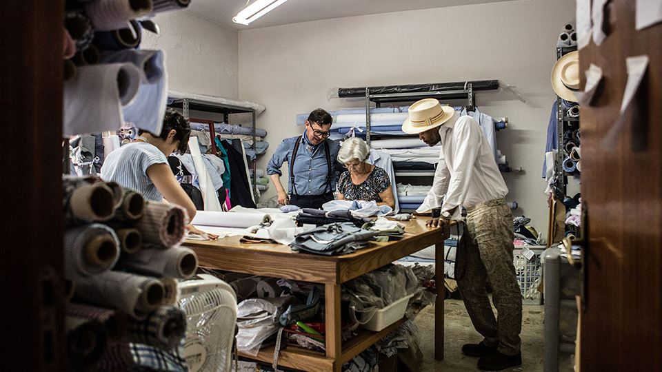 People working in Italian tailor shop G. Inglese