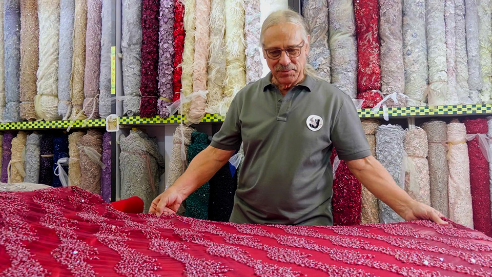 Man in fabric store